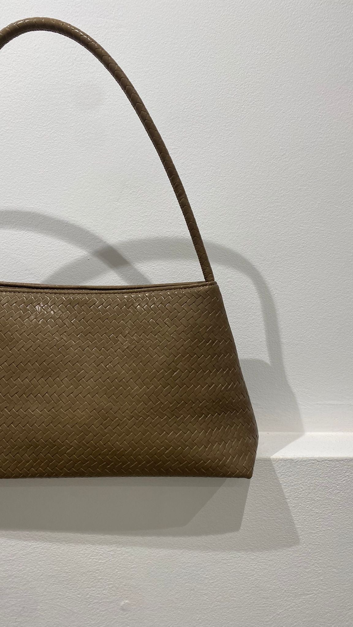 Bolso de mano trenzado