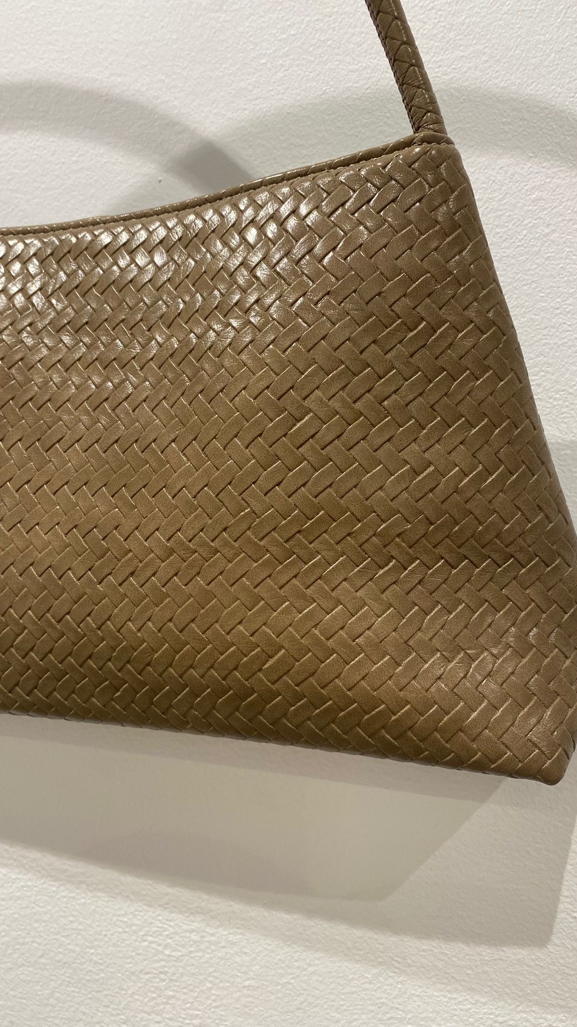 Bolso de mano trenzado