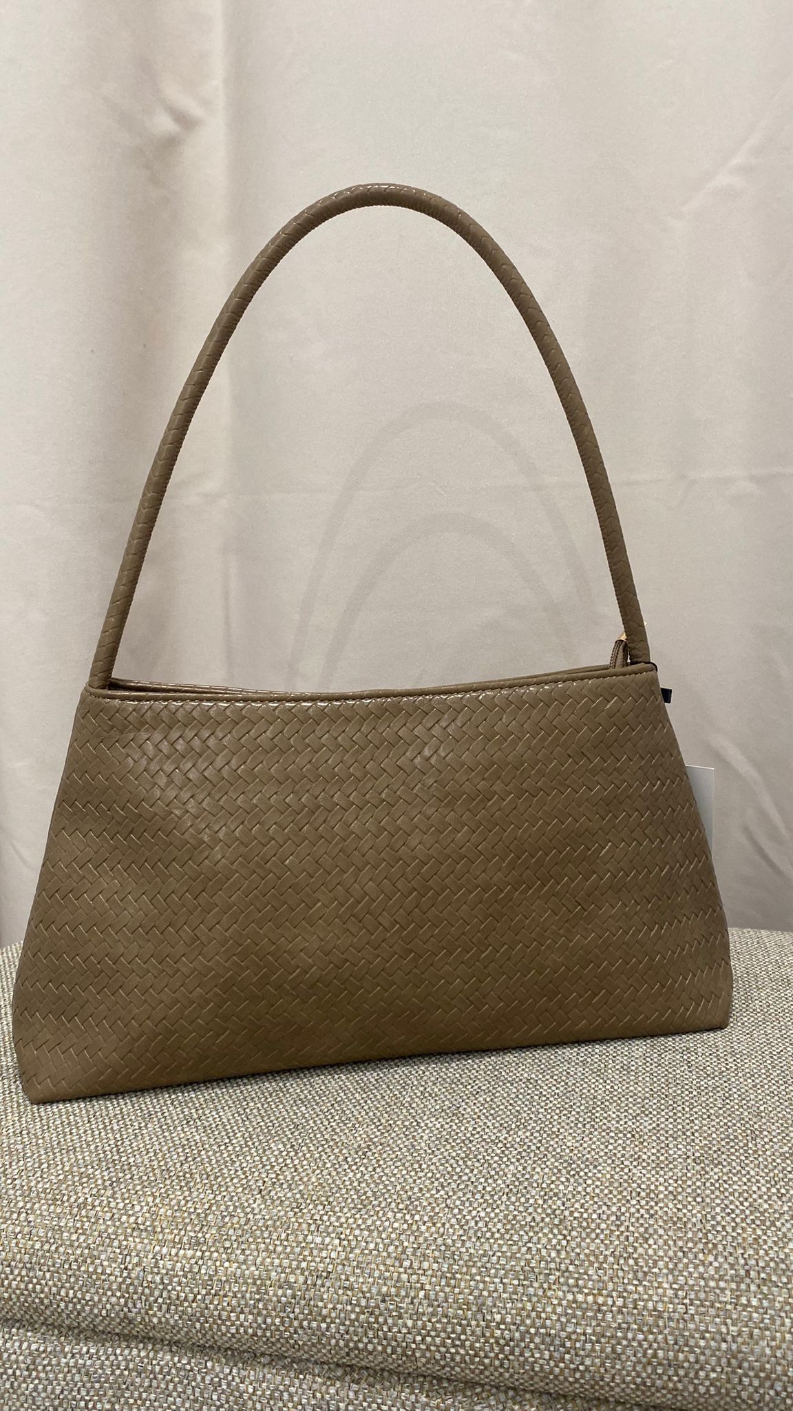 Bolso de mano trenzado