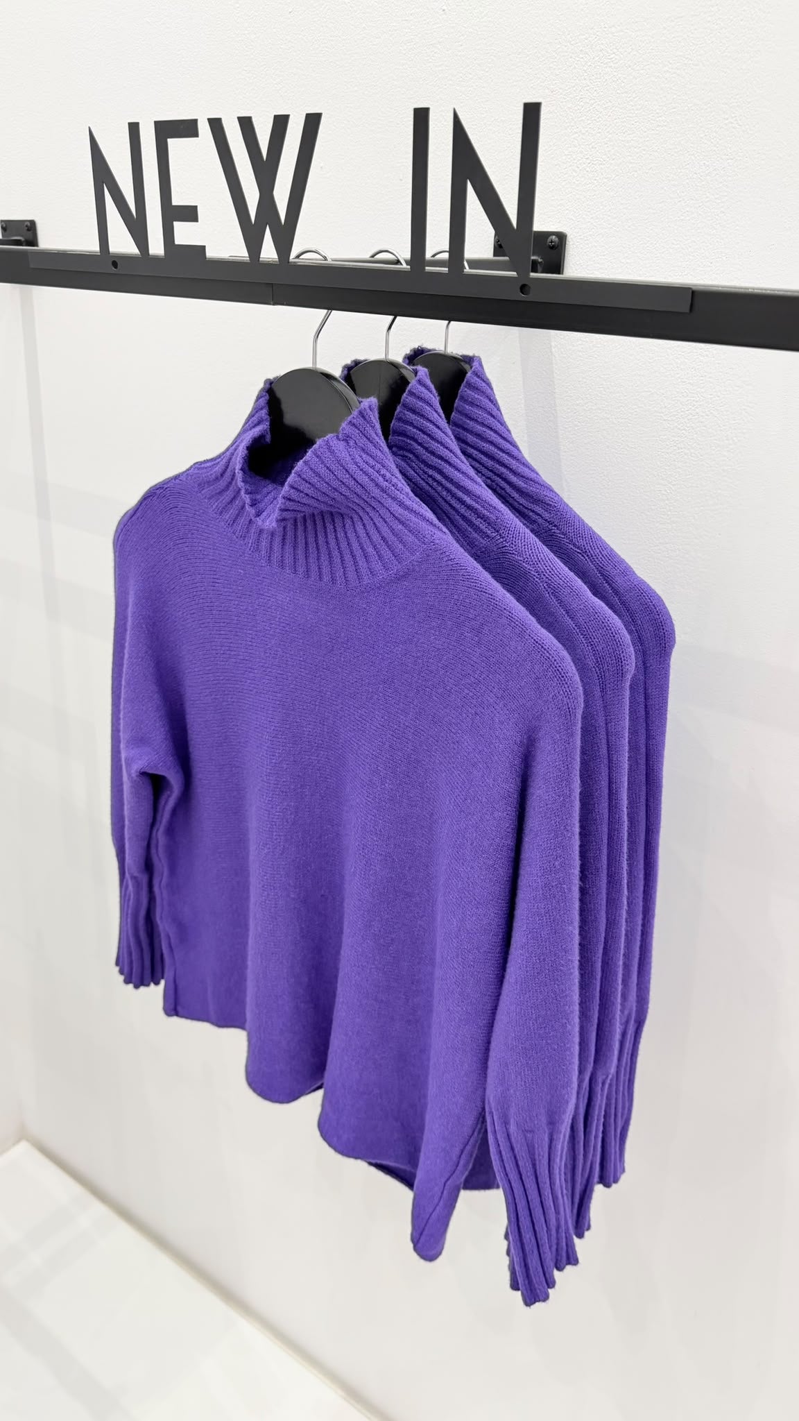 Jersey lila cuello chimenea