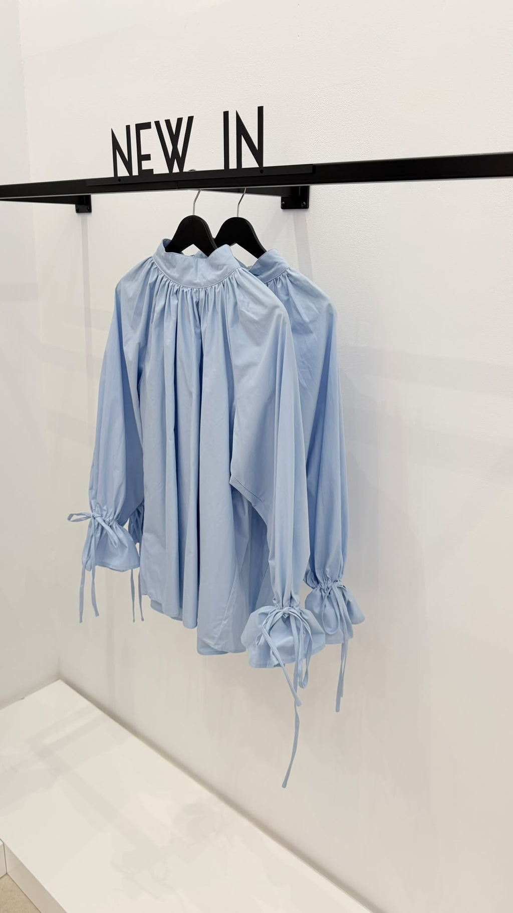 Blusa azul celeste puño recogido