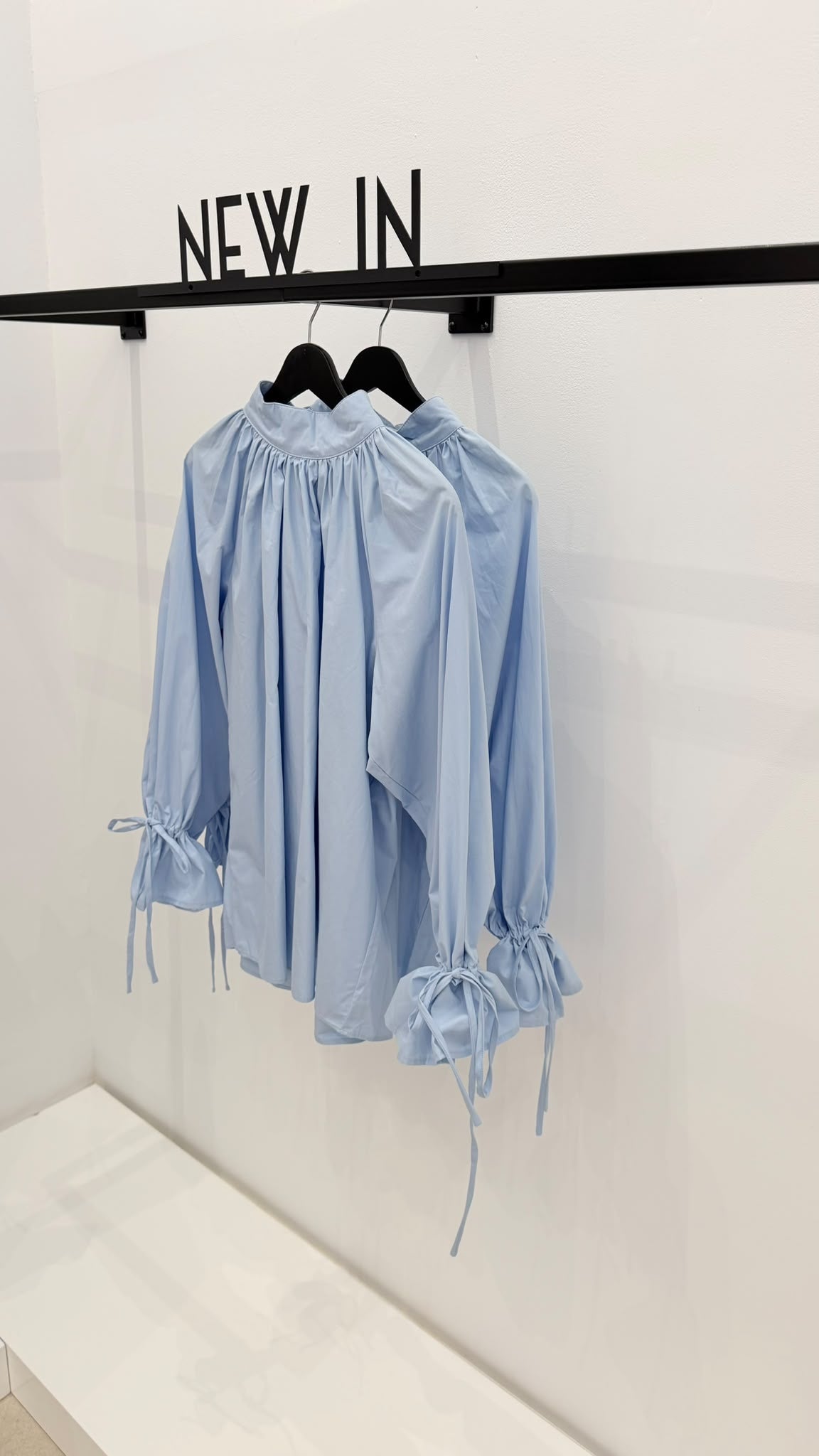 Blusa azul celeste puño recogido