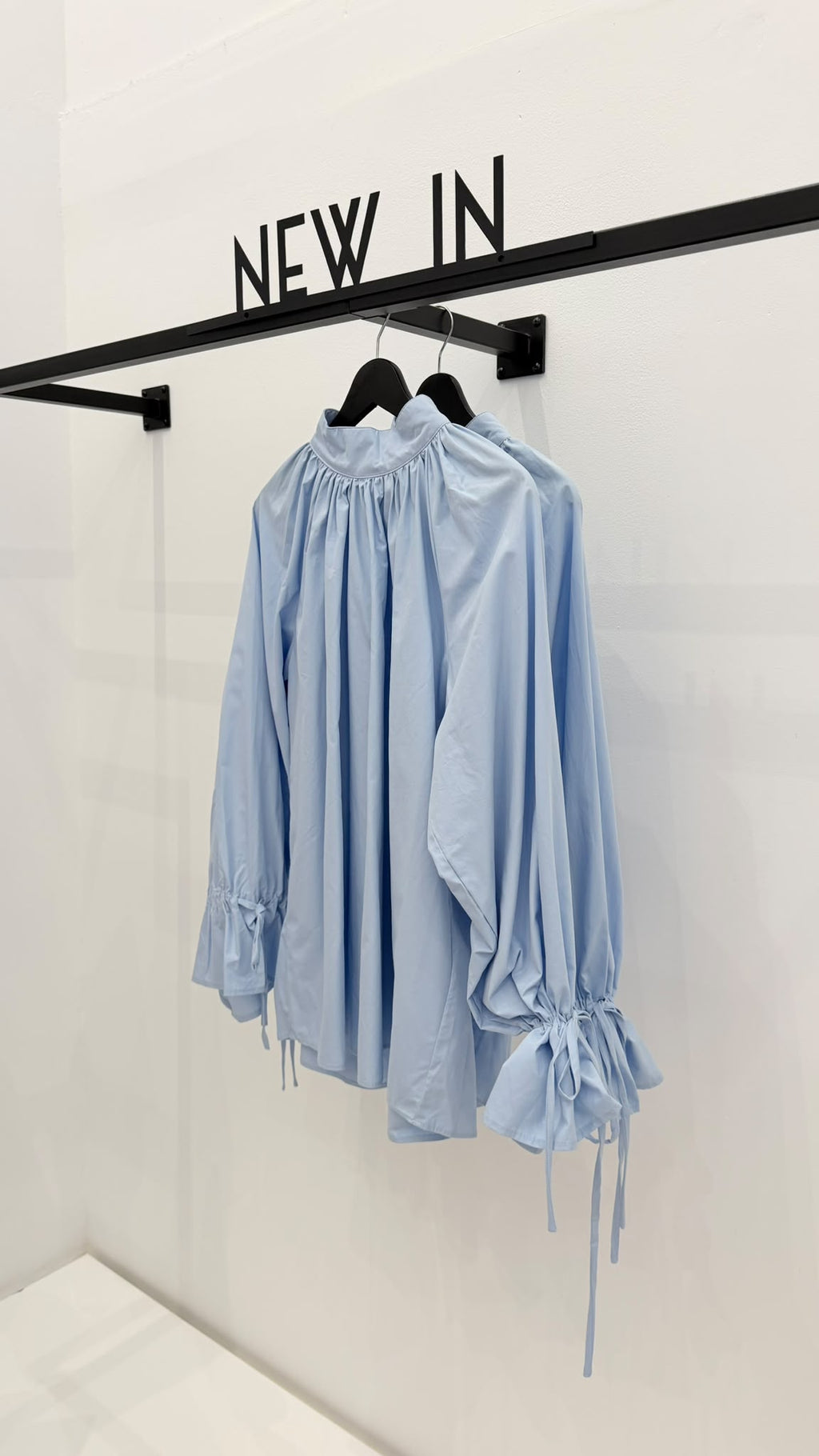 Blusa azul celeste puño recogido