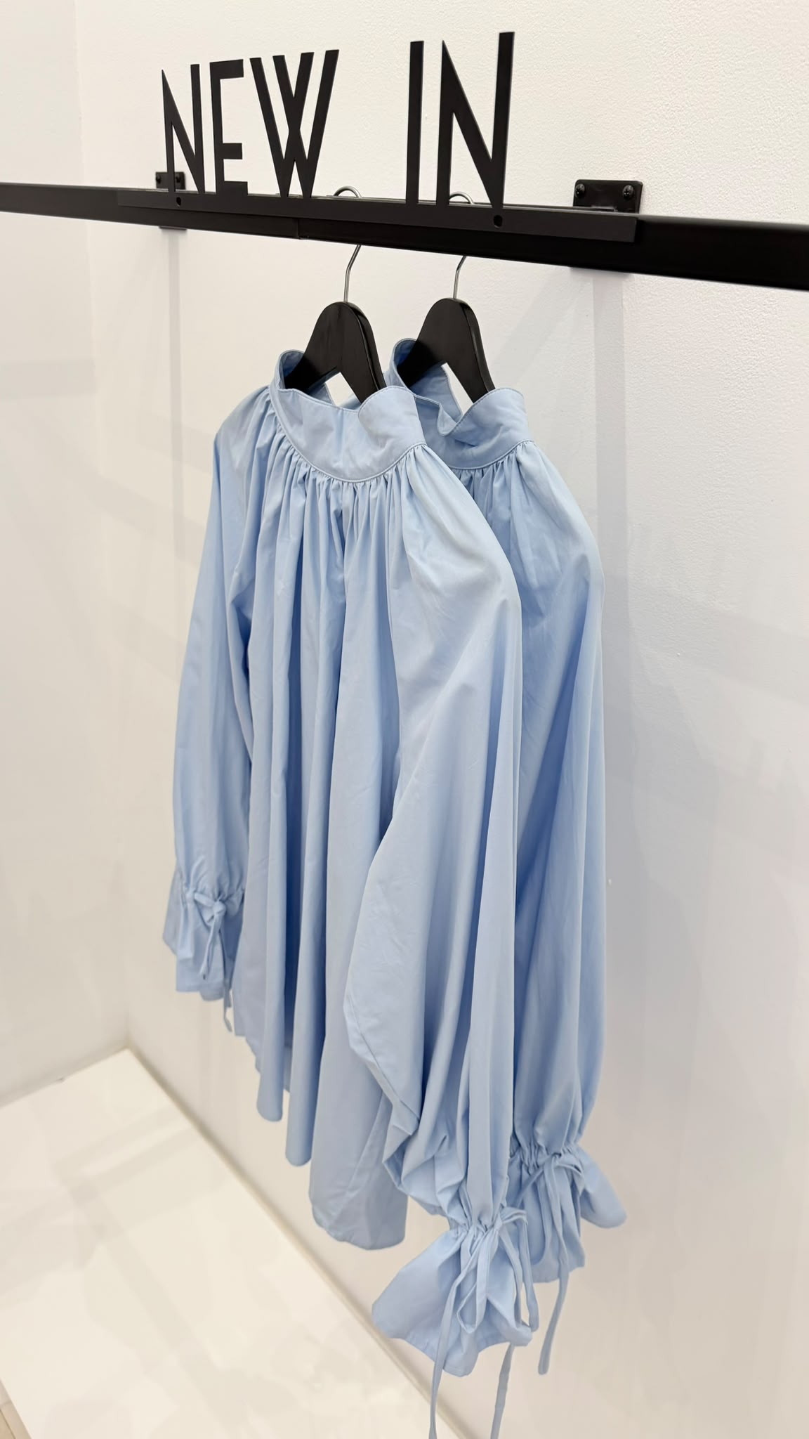 Blusa azul celeste puño recogido